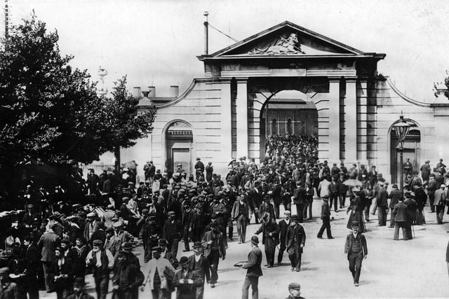 Workers leaving for the day at Portsmouth Dockyard's Unicorn Gate about 1910. Picture: costen.co.uk