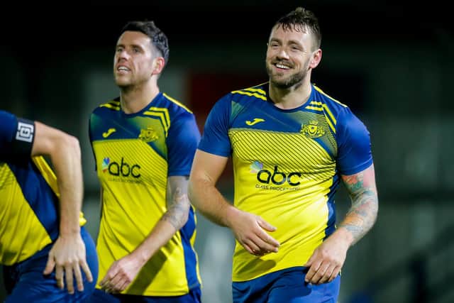 Steve Hutchings is all smiles after his goal against Alresford. Picture by Dave Bodymore