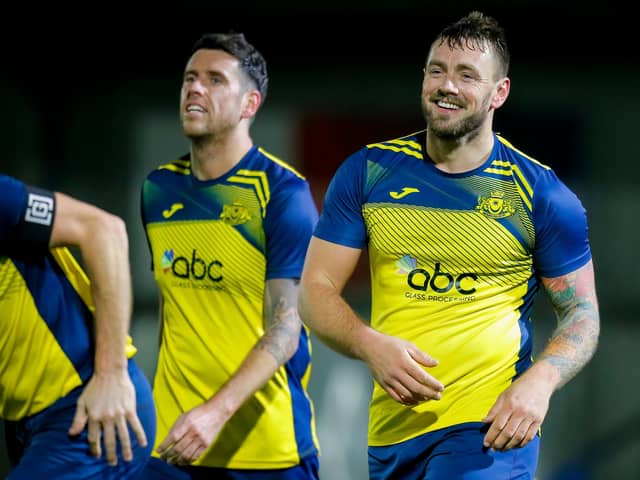 Steve Hutchings is all smiles after his goal against Alresford. Picture by Dave Bodymore
