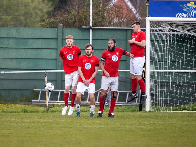 Gosport Town defend a free-kick during their 4-0 victory over Lee Rangers in the Portsmouth & District FA Trophy final at Cams Alders. Picture: Alex Shute