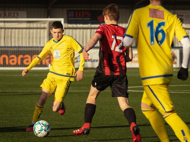 Action from the U16 GEC Marconi Invitation Cup final between Horndean Hawks Condors (red/black) and Pickwick Youth Panthers (yellow). Picture: Keith Woodland (260221-459)