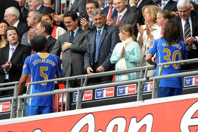 Glen Johnson goes up to collect his FA Cup winners' medal. Picture: Allan Hutchings