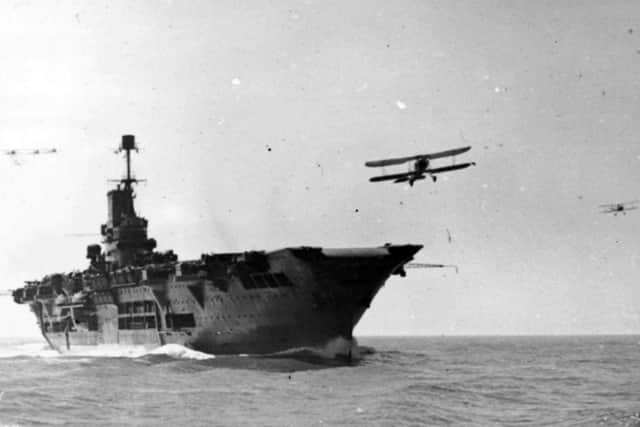 HMS Ark Royal with planes buzzing around her during a patrol.  Picture: Keystone/Getty Images