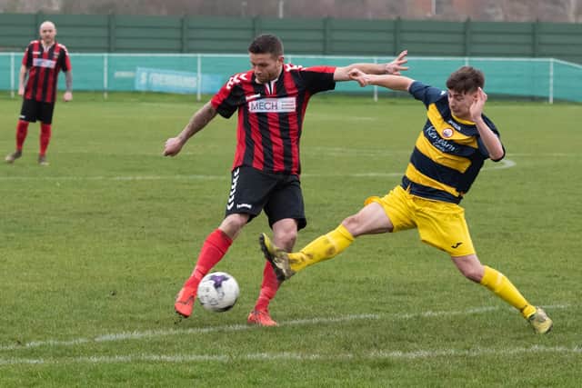 Fareham's Gary Austin fires in a shot during the win against Lymington. Picture: Duncan Shepherd