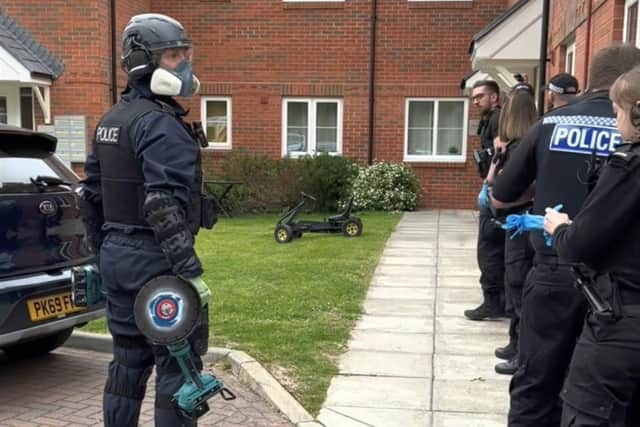 Police lining up to storm the house in Horndean. Picture: Hampshire and Isle of Wight Constabulary.