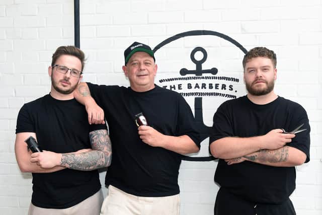 The Barbers in Pembroke Road, Old Portsmouth, will be opening their doors on Sunday, September 18, between 10am-1pm exclusively for HM forces who are getting ready for Queen Elizabeth II funeral on Monday.
Pictured is: (l-r) Pete Clements, barber, Bob Jennings, manager, and Ashley Caisley, barber.