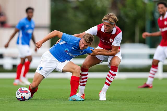 Dan Gifford fights to retain possession against Bristol City's Ryley Towler in the recent behind-closed-doors friendly. Picture: Rogan/Fever Pitch