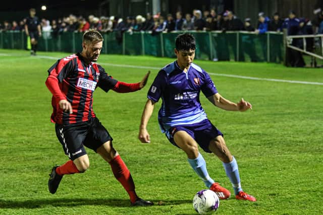 Patrik Hnath, right, in action for Portchester during last season's 3-1 Wessex derby win at Fareham Town. Picture: Jordan Colborne