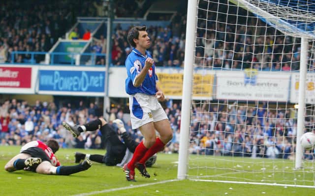 Svetoslav Todorov scores as Pompey win the Division One title against Rotherham. (Photo by Mike Hewitt/Getty Images)