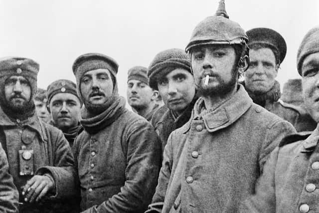 London Rifle Brigade with German soldiers from the 104th and 106th Saxon Regiments on Christmas Day 1914.  (Photo: IWM North, part of Imperial War Museums)