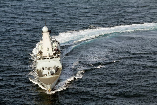 HMS Dauntless doing a doughnut, carving up the waves in the North Sea.
