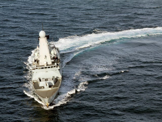 HMS Dauntless doing a doughnut, carving up the waves in the North Sea.