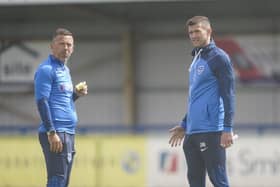 Pompey head coach John Mousinho and his assistant Jon Harley will be overseeing the Westleigh Park clash with Hawks this afternoon.