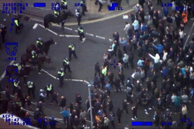 Violent disorder at the Pompey v Southampton game on September 24 in 2019. Pictures from Hampshire police video taken on the night.