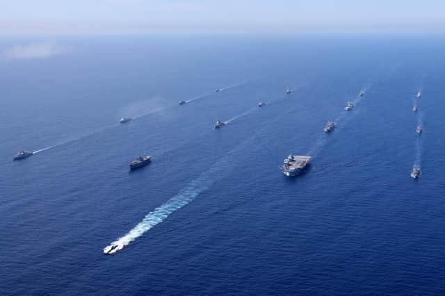 HMS Queen Elizabeth and the UK Carrier Strike Group joined ships from NATO Standing Maritime Groups One and Two for an impressive display of maritime power in the Eastern Atlantic on 28 May 2021. The rendezvous was part of Steadfast Defender 21, a large scale defensive exercise designed to test NATO’s ability to rapidly deploy forces from North America to the coast of Portugal and the Black Sea region.
