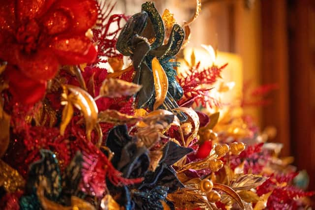 Installation of A Palace House Christmas begins with the floristry