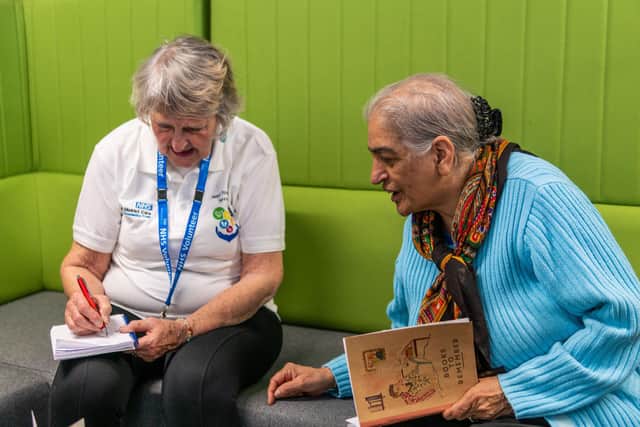 A healthcare volunteer at work