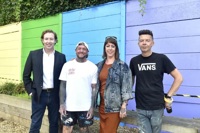 The Love is Love mural aims to promote LGBTQ+ rights. Pictured is: (l-r) Cllr Chris Attwell, artist Mister Samo, Annabel Innes, director of Form + Function and artist Fark. Picture: Sarah Standing (010923-7769)