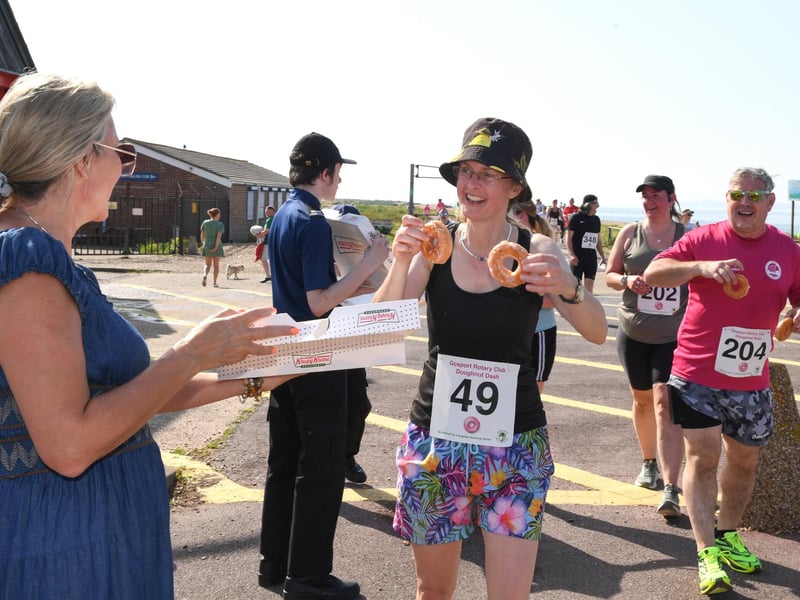 Gosport MP Dame Caroline Dinenage hands out doughnuts.
Credit: Paul Jacobs/pictureexclusive.com