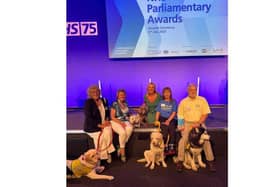 Pets As Therapy team has received the Volunteer Award at the NHS Awards.
Pictured:  (Right to left) Snowy and Steven, Whiskey and Lesley, Maggie & Mollie and Tess, Louis and Madeleine