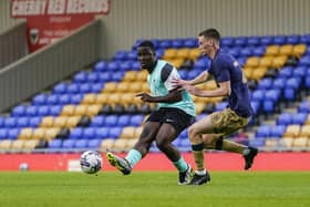 Christian Saydee fires in a shot during Pompey's 1-0 friendly defeat at AFC Wimbledon on Tuesday night. Picture: Jason Brown/ProSportsImages