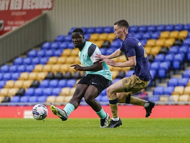Christian Saydee fires in a shot during Pompey's 1-0 friendly defeat at AFC Wimbledon on Tuesday night. Picture: Jason Brown/ProSportsImages