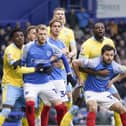 Joe Rafferty and Joe Pigott jostle inside Sheffield Wednesday's box in anticipation of a Pompey corner. Picture: Jason Brown/ProSportsImages