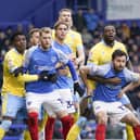 Joe Rafferty and Joe Pigott jostle inside Sheffield Wednesday's box in anticipation of a Pompey corner. Picture: Jason Brown/ProSportsImages