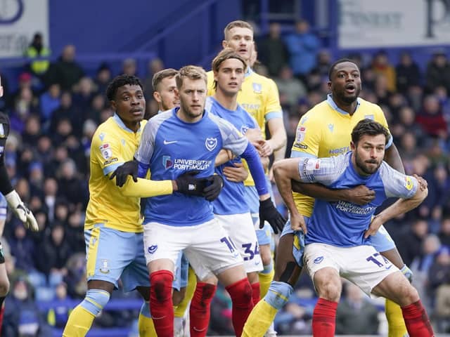 Joe Rafferty and Joe Pigott jostle inside Sheffield Wednesday's box in anticipation of a Pompey corner. Picture: Jason Brown/ProSportsImages
