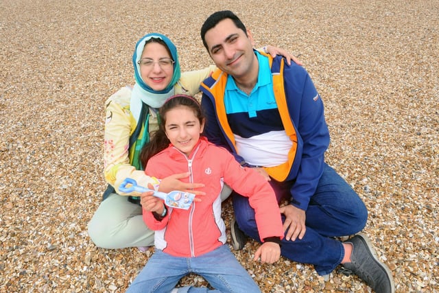 Yasmin Kalantar with her husband Iman Mohagheghian and their daughter Bahar Mohagheghian (10). Picture: Sarah Standing (020522-3320)
