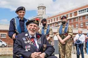 D-Day veteran Joe Cattini escorted by Portsmouth Sea Cadet Hayden Temperton in 2021 Picture: Mike Cooter (250621)