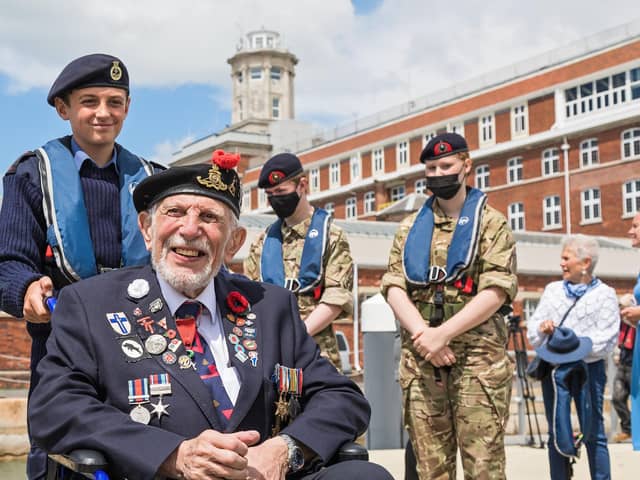 D-Day veteran Joe Cattini escorted by Portsmouth Sea Cadet Hayden Temperton in 2021 Picture: Mike Cooter (250621)