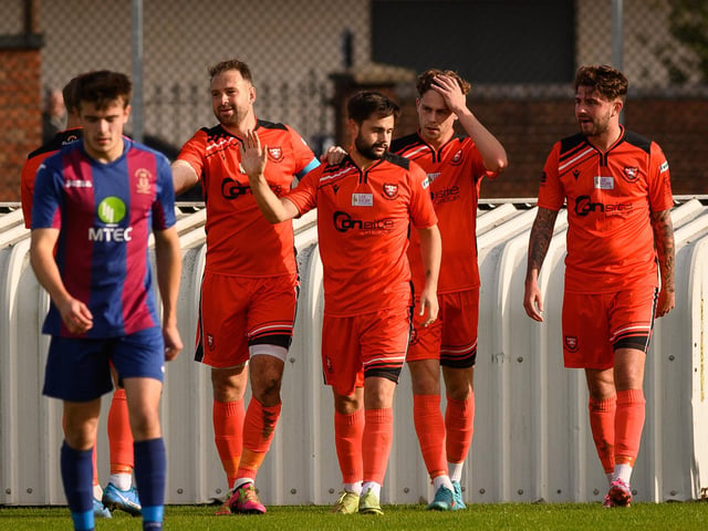Brett Pitman celebrates one of his two first-half goals. Picture: Keith Woodland