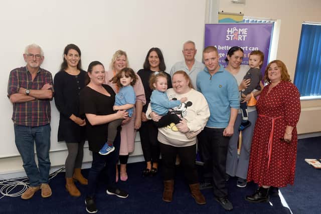 Home Start Portsmouth are celebrating their 30th anniversary in November 2022.
Pictured is: Home Start Portsmouth staff and volunteers with families they have helped.
Picture: Sarah Standing (171022-4721)