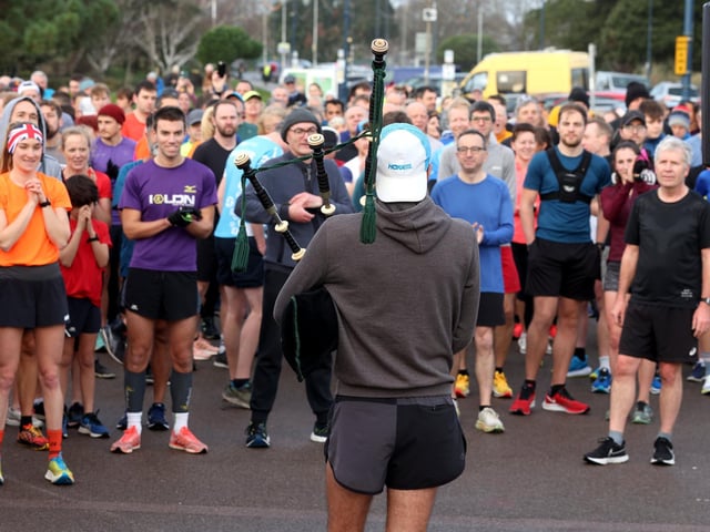 Piper Dan playing before the New Year's Day Southsea parkrun. Photograph by Sam Stephenson