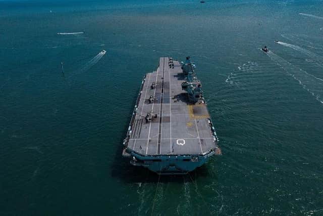 HMS Queen Elizabeth leaves Portsmouth on June 7 to carry out her first flight trials with the F-35 stealth jet in British waters. Photo: Luke Channer / @sky_grammers