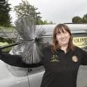 Susan Oliver (48) from Denmead, owns a 1959 Bedford CA van called Nancy which she operates her business Oliver Chimney Sweep from. 

Picture: Sarah Standing (140723-6687)