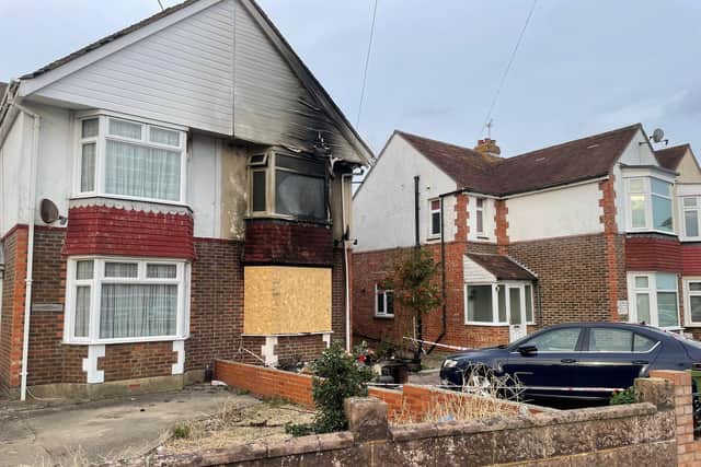 The aftermath of a severe house fire in White Hart Lane, Portchester, taken on September 22. A HIWFRS spokesman said the fire was 'well alight' and the ground floor lounge was 'destroyed'. Picture: Rob Cusack.