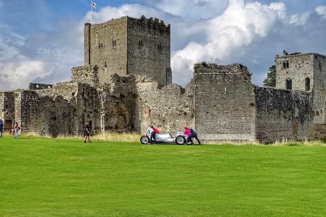 Wheeling away one of the exhibits at the recent BBC Antiques Road Show at Portchester Castle taken by Trev Harman