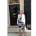 Dr Barbara Rushton standing outside number 10.