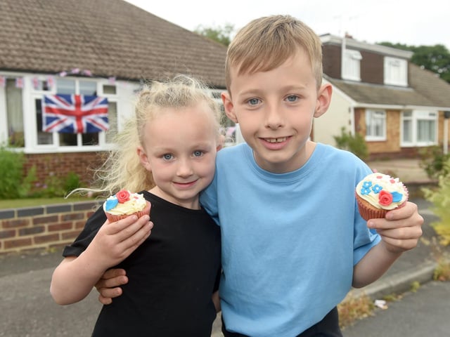 Becca Eastman, five, and Declan Fryer, 10, in Rowan Avenue, Cowplain at Friday's street party
(030622-9230)