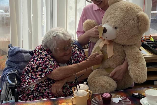 Big bear, bigger smile for a Bedhampton Court resident.