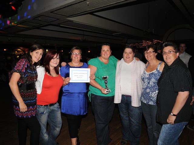 2009 Division D winners, Meon Valley, pick up their trophy at South Parade Pier.