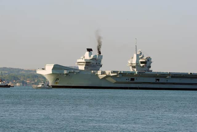 HMS Queen Elizabeth heads off
Picture: Sarah Standing (150520-1969)