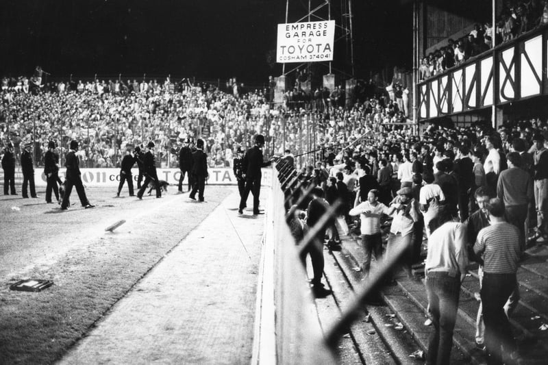 Police dealing with disturbances at Fratton Park in September 1986. The News PP1090