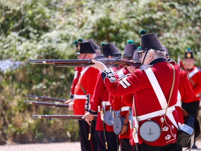 Reenactors showing off their skilled during a firing display of canons and muskets at Fort Brockhurst on Saturday
