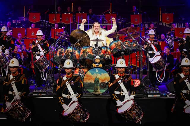 Pictured: Nico McBrain of Iron Maiden plays on stage with the Royal Marines Band Service during the Mountbatten Festival of Music at the Royal Albert Hall on March 7.