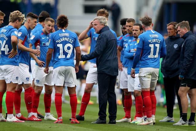 Kenny Jackett talks to his players during a drinks break Pic: Andrew Matthews/PA Wire.