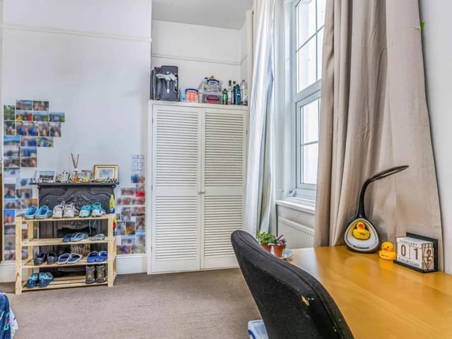The listing says: "The interior boasts a thoughtful design to accommodate shared living. Two well-appointed shower rooms cater to the needs of the occupants, ensuring convenience and comfort."