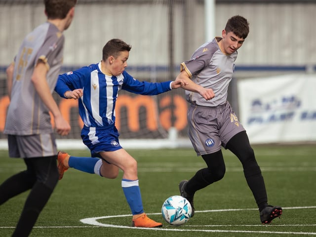 Action from the U15 Campbell McFaull Invitation Cup final between Hayling St Andrews Blue and Hayling St Andrew White. Picture: Keith Woodland (260221-102)